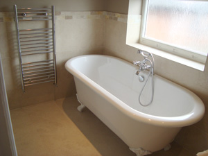 A bathroom with free standing bath and heated towel rail - Nantwich, Cheshire
