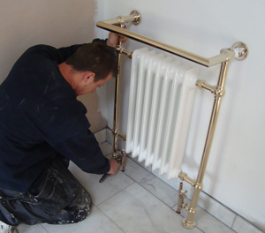 Fitting a radiator and heated towel rail unit
